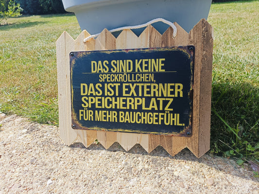 Metal sign "External storage space for more gut feeling, on old wood